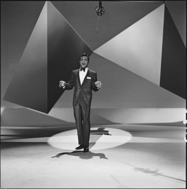 American singer Jackie Wilson performs on an episode of 'The Ed Sullivan Show,' New York, New York, December 4, 1960.