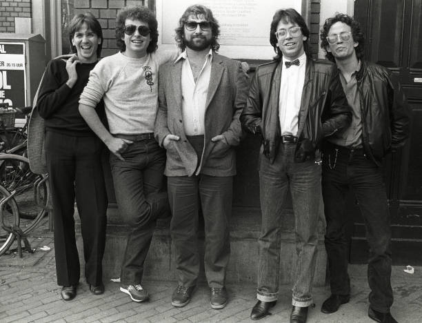 Group portrait of American rock band Toto, Amsterdam, Netherlands, 27th September 1982. L-R Mike Porcaro, Steve Lukather, David Paich, Jeff Porcaro...