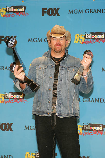 Musician Toby Keith winner of Country Artist of the Year and Country Album Artist of the Year poses in the press room at the 2005 Billboard Music...